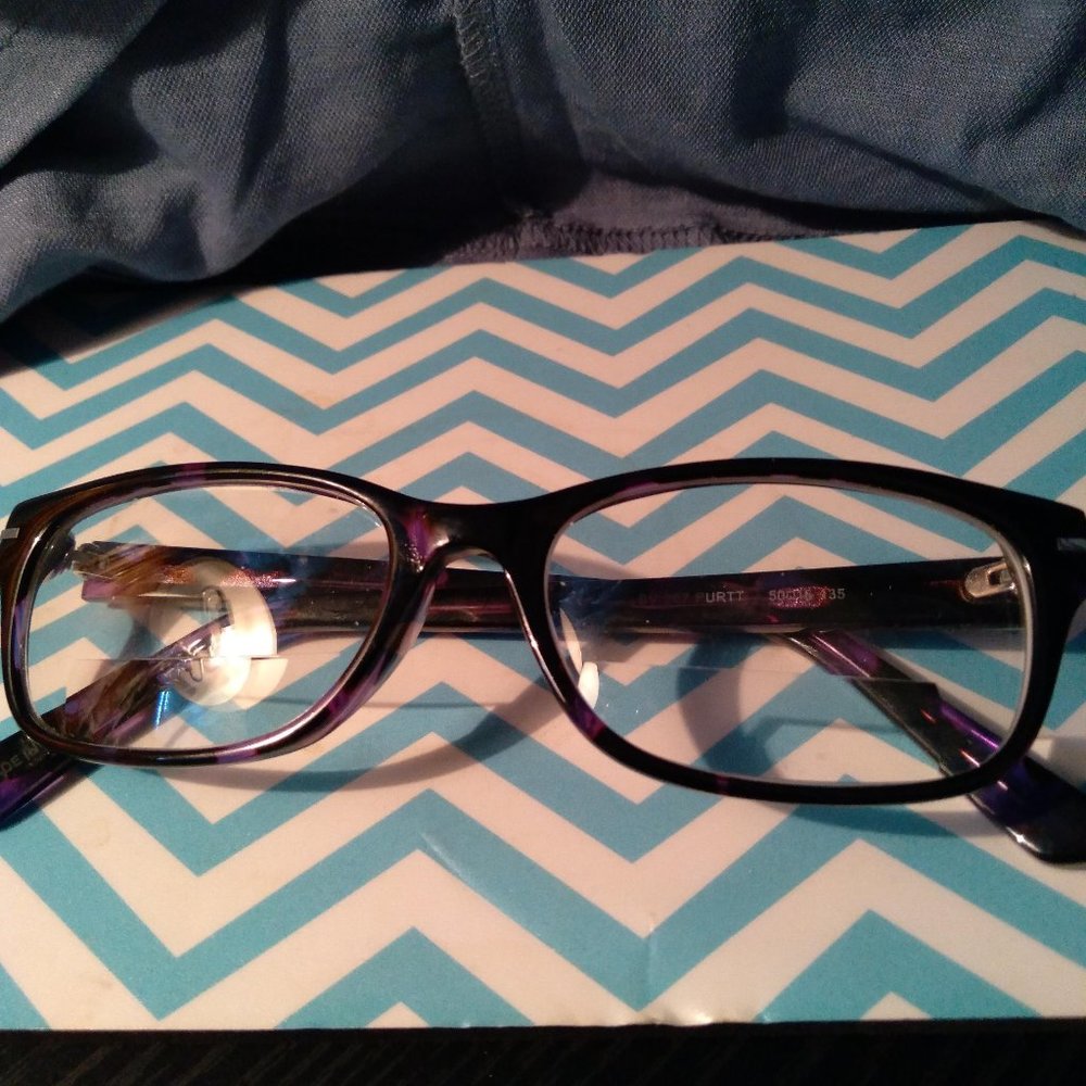 Warby Parker 2.00 bifocals. Prescription on top half of frame/2.00 on bottom